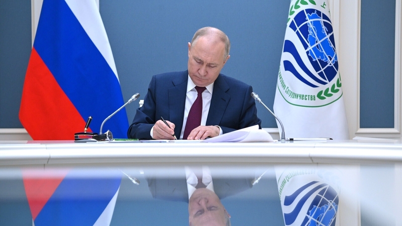 Russian President Vladimir Putin signs the New Delhi Declaration at today's virtual meeting of the Shanghai Cooperation Organisation
