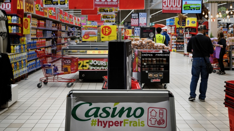 Casino will present two rival bids to representatives of its debt holders today at a meeting hosted by France's finance ministry