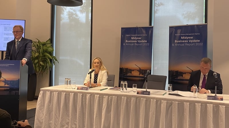 Frank O'Connor, NTMA CEO, Michelle Lowe, NTMA's Senior Corporate Communications Manager and Finance Minister Michael McGrath at today's briefing