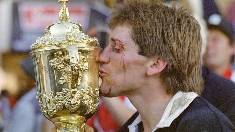 New Zealand captain David Kirk kisses the Webb Ellis trophy after their 29-9 win against France in the first Rugby World Cup final