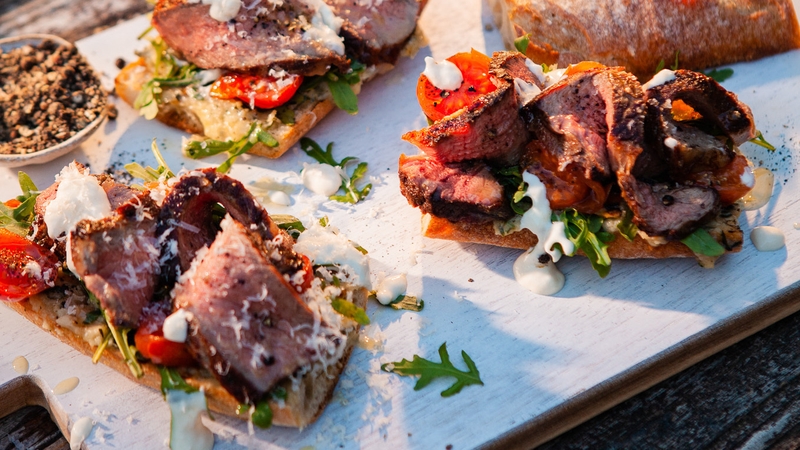 This juicy steak sandwich is served with roast shallot, garlic and tarragon butter, with a slathering of horseradish mayo for an extra kick.