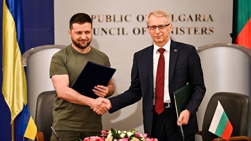 Volodymyr Zelensky shakes hands with Bulgaria's Prime Minister Nikolai Denkov in Sofia