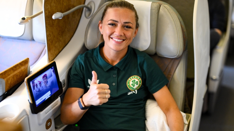 Ready for lift-off: Katie McCabe all smiles as she boards her flight to Australia