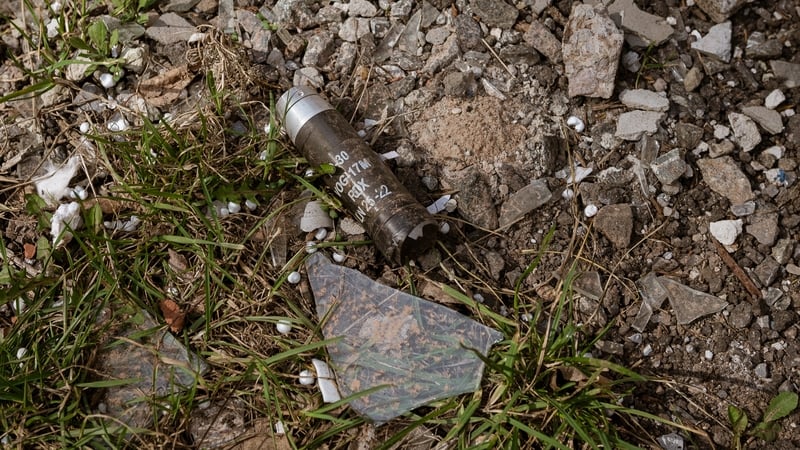 A cluster bomb capsule is seen on the ground amid fighting at the frontline city of Avdiivka in Ukraine