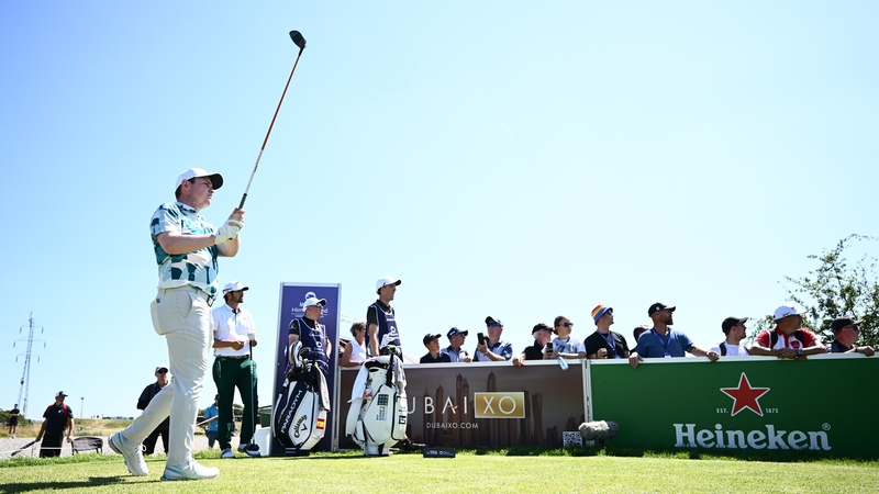 McIntyre watches a tee shot