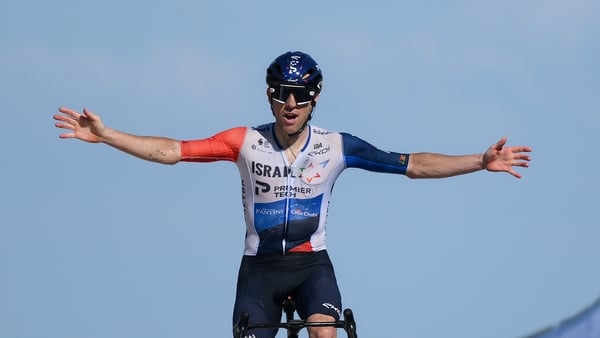 Michael Woods celebrates his win