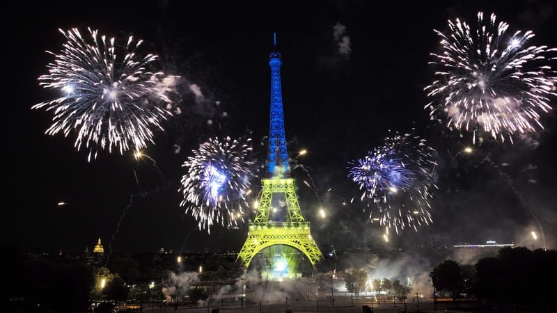 Fireworks explode above the Eiffel Tower as part of Bastille Day celebrations last year