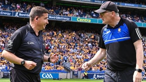 Brian Lohan and referee Colm Lyons in relatively jovial form before the game