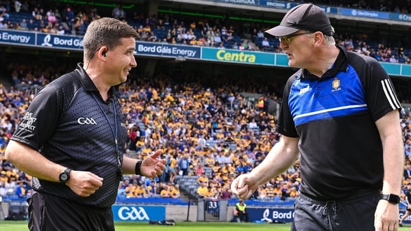 Brian Lohan and referee Colm Lyons in relatively jovial form before the game