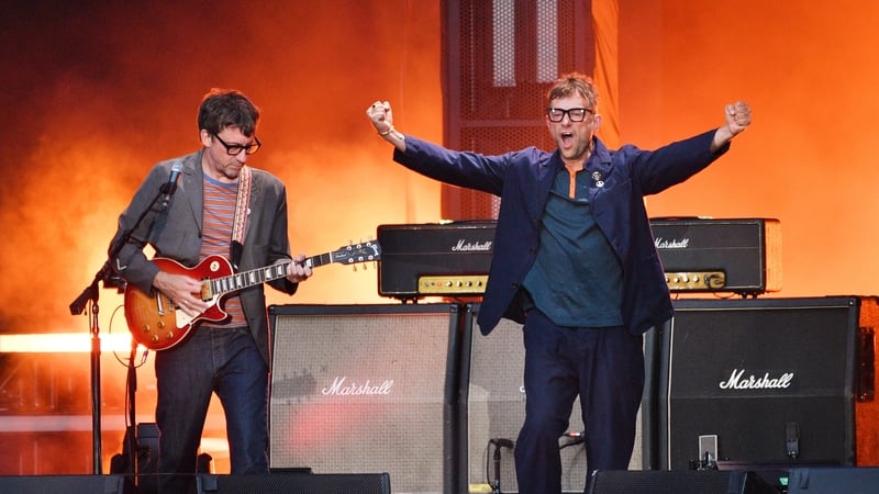 Damon Albarn (R) and Graham Coxon of Blur perform at Wembley Stadium on Saturday in London, England. (Photos by Jim Dyson/Getty Images)