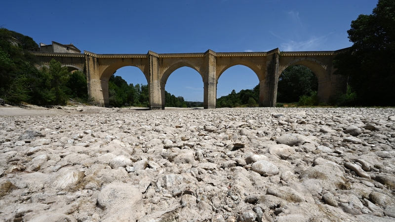 A parched river bed in southern France after a heatwave last summer