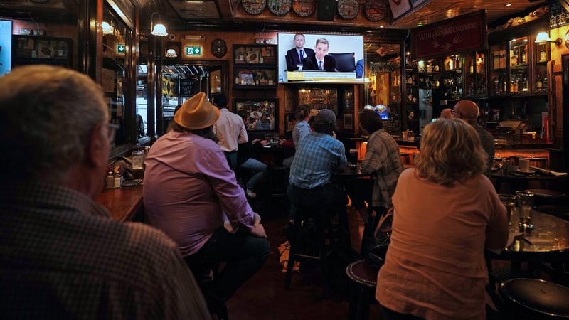 Members of the public in the Doheny and Nesbitts pub, Dublin, watching the Oireachtas TV broadcast of the PAC this morning