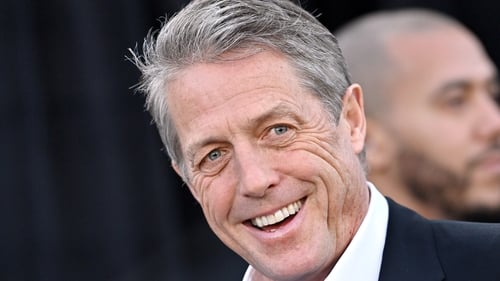 Hugh Grant has settled his claim