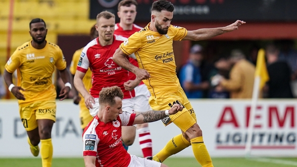 Edis Agovic of F91 Diddeleng is tackled by Sam Curtis of St Patrick's Athletic