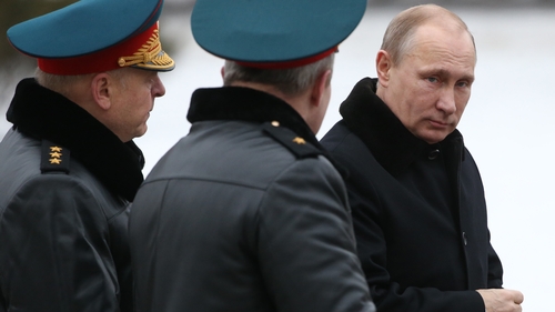 Vladimir Putin (R) has been in power in Russia for 24 years