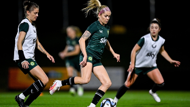 Denise O'Sullivan glides past Sinead Farrelly and Marissa Sheva during training in Brisbane