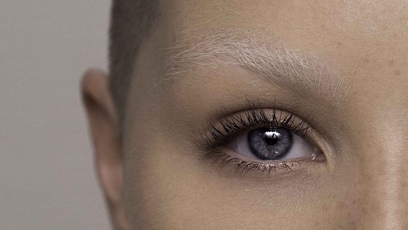 Experts explain what you need to know about eyelash-enhancing products. By Katie Wright.