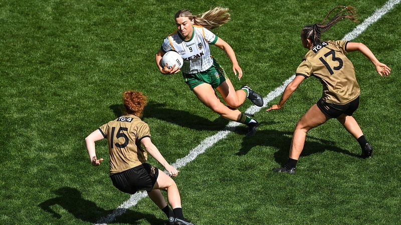 Orlagh Lally of Meath in action against Kerry players, Louise Ní Mhuircheartaigh, 15, and Paris McCarthy during the 2022 All-Ireland final
