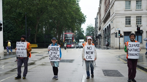 Just Stop Oil climate activists slow walk in the streets of London on the 14th of July 2023, Central London, United Kingdom. Photo by Kristian Buus/In Pictures via Getty Images