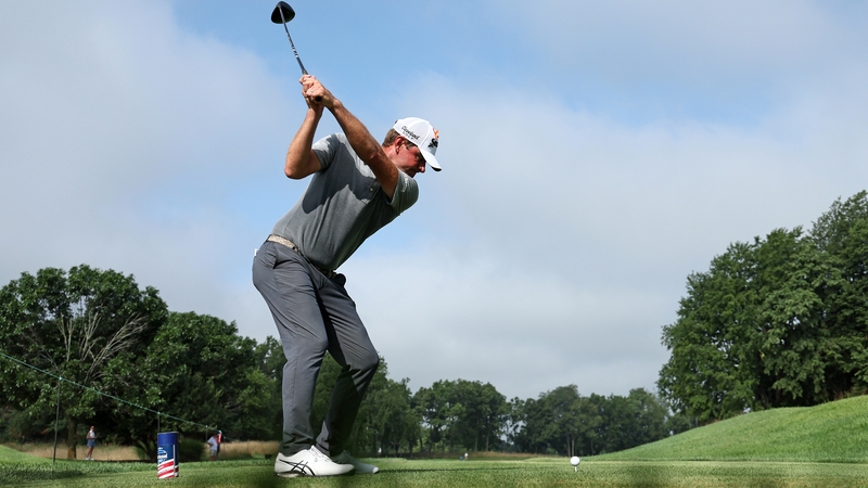 Lucas Glover makes his drive from the first tee