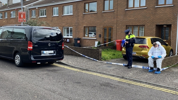 The woman's body was found at a house in Cardinal Court