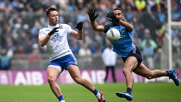Dessie Ward of Monaghan in action against James McCarthy of Dublin