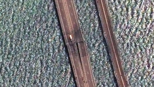A satellite image shows the damage to the bridge
