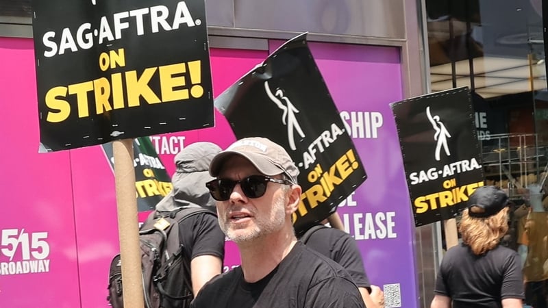 Christian Slater joins the picket line in New York