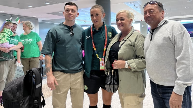 Ireland captain Katie McCabe was met by dad Gary, mam Sharon and brother Shane at Sydney Airport