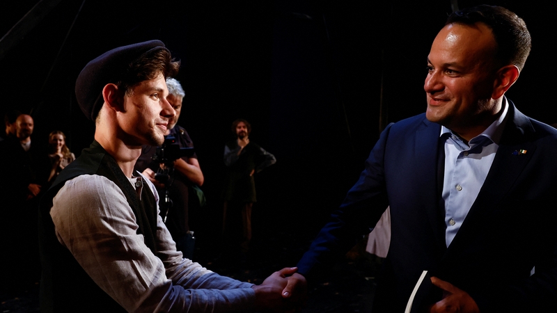 Taoiseach Leo Varadkar shakes hands with actor Oleksandr Hrekov as he visits Lesya Ukrainka Theatre in Kyiv