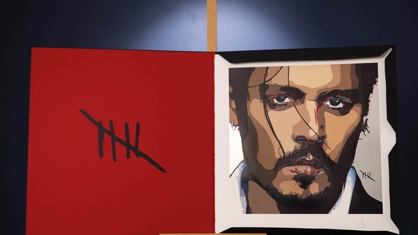 A self-portrait by Johnny Depp titled 'Five' is unveiled at Castle Fine Art in London ahead of prints being available to buy online and in nationwide UK galleries from today