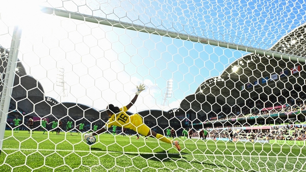 Chiamaka Nnadozie gets down well to her left to save the penalty