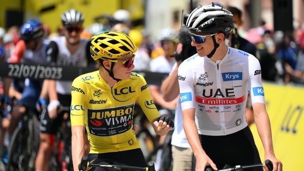 L-R) Jonas Vingegaard and Tadej Pogacar vied for supremacy on stage 20
