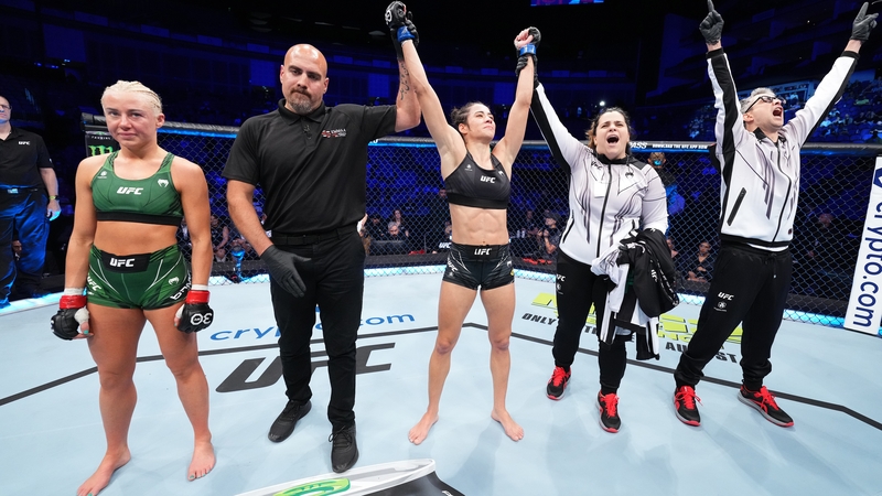 Bruna Brasil celebrates after defeating Shauna Bannon