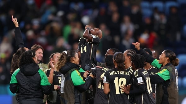 Jamaica celebrate their first point at a World Cup