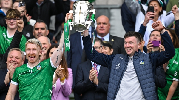 Cian Lynch and injured captain Declan Hannon celebrate with the Liam MacCarthy Cup