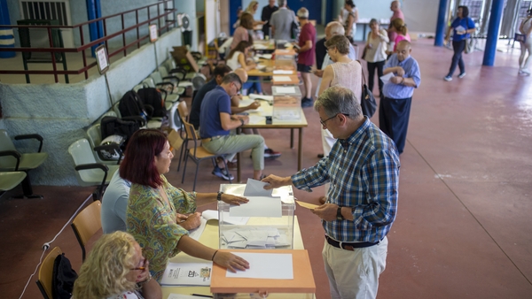 With 99% of votes counted the opposition People's Party had 136 seats