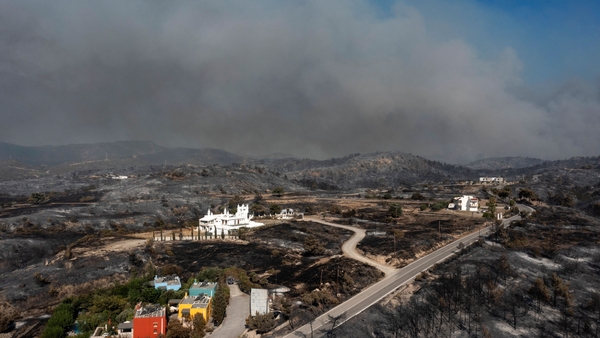 Smoke billows over Kiotari village on the island of Rhodes
