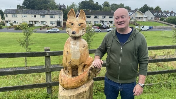 Jimmy Cosgrave with one of his carvings in Smithborough, Co Monaghan