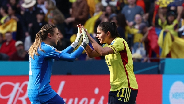 Catalina Usme (R) celebrates with Catalina Perez