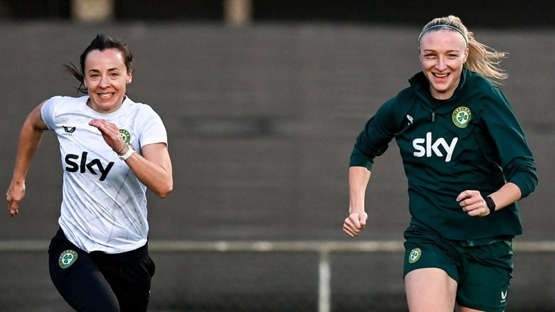 Louise Quinn (R) and physiotherapist Angela Kenneally sprint at training in Perth