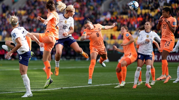 Lindsey Horan (10) heads the USA equaliser