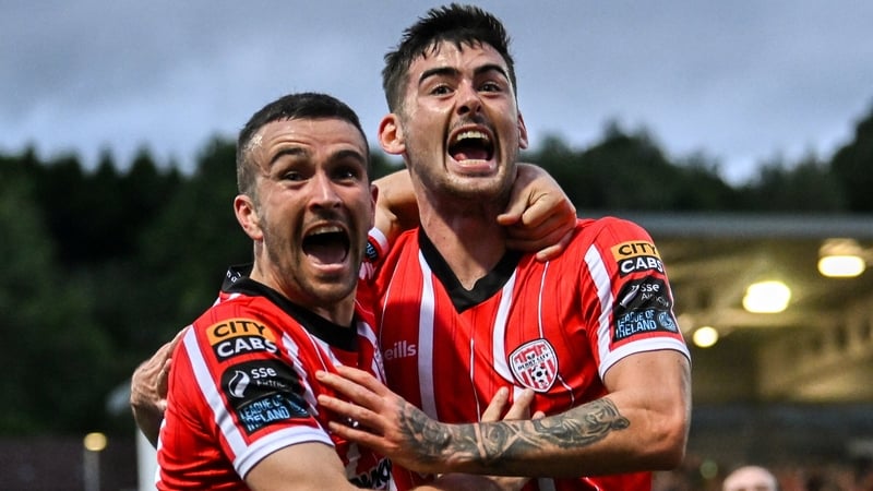 Cian Kavanagh, right, celebrates with Michael Duffy after scoring the winner