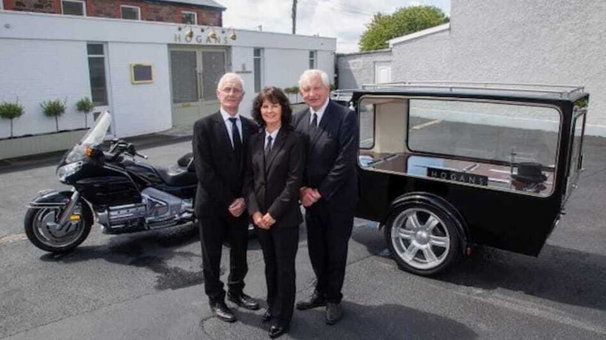 Kerry funeral director with motorcycle hearse