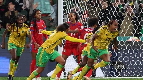 Allyson Swaby (R) celebrates after scoring what would be the winner