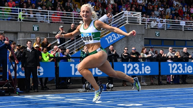 Sarah Lavin crosses the line to win the women's 100m hurdles during day one of the 123.ie National Senior Outdoor Championships