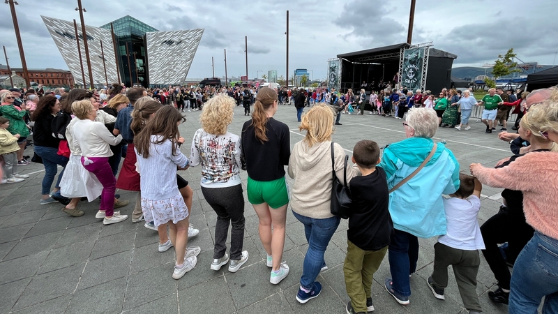 Crowds take part in the céilí mór on the slipway where the Titanic was built