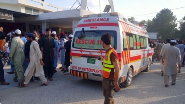 An ambulance carries the injured to the hospital following the blast