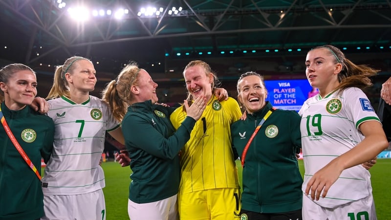 Courtney Brosnan congratulated by her team-mates after the game