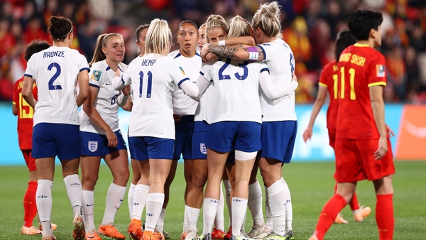 England's Alessia Russo celebrates with team-mates after the opening goal against China